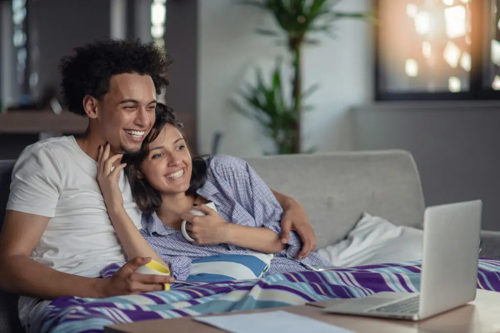 A couple on devices connected to Xfinity Internet in Michigan. They are a part of the company’s Five-Year Price Guarantee offering no contract, unlimited data and one year of Unlimited Xfinity Mobile included.