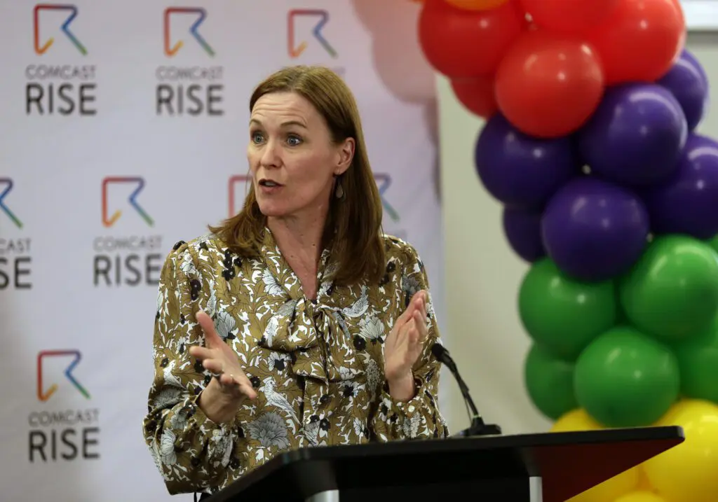 Michigan Senate Majority Leader, Winnie Brinks, is seen speaking during the Comcast RISE kickoff event