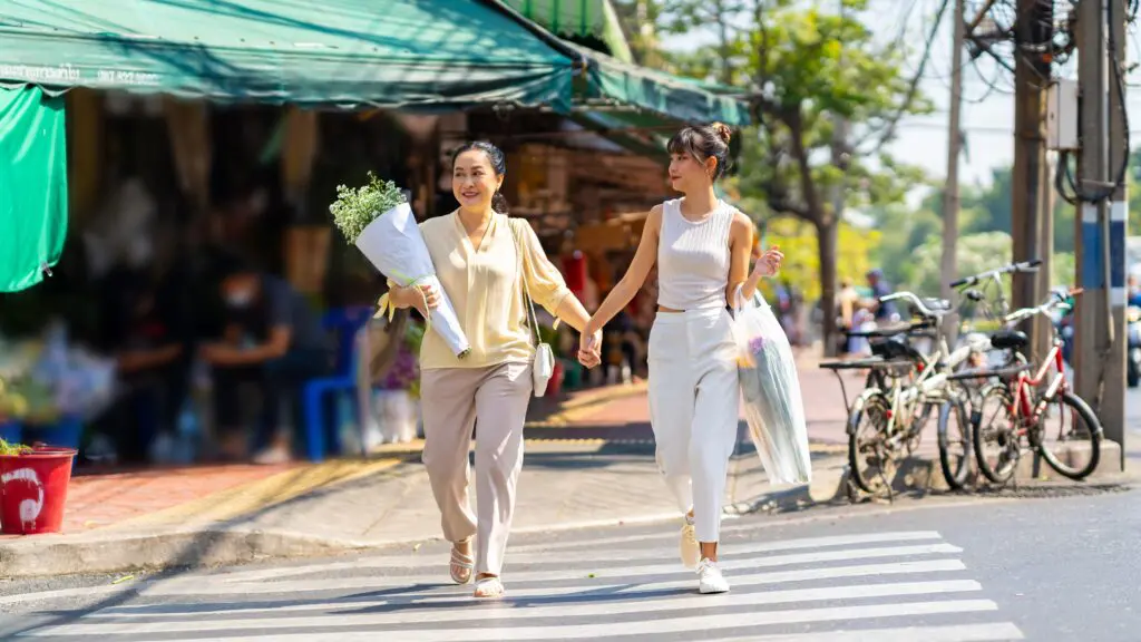 Two women at a crosswalk