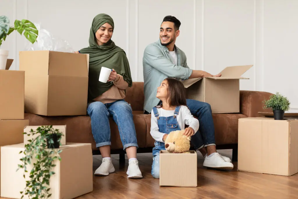 A family moving easily signed up for Xfinity Internet at their new home with the Xfinity tips for moving in MIchigan.