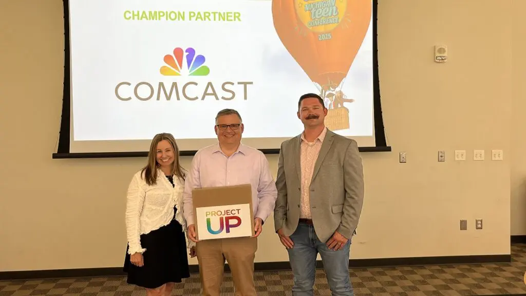 Samaritas CEO, Dave Morin stands with Comcast Director of Community Investment Jen Jambor and Government Affairs Manager Matt Erikson at the annual Michigan Teen Conference.