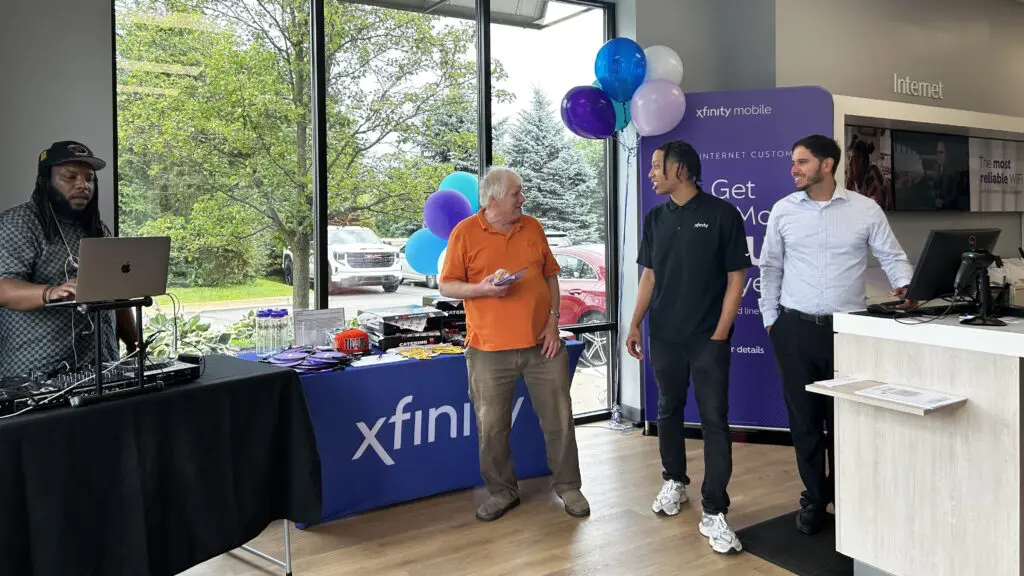 Xfinity employees and guests at the White Lake Xfinity Store opening