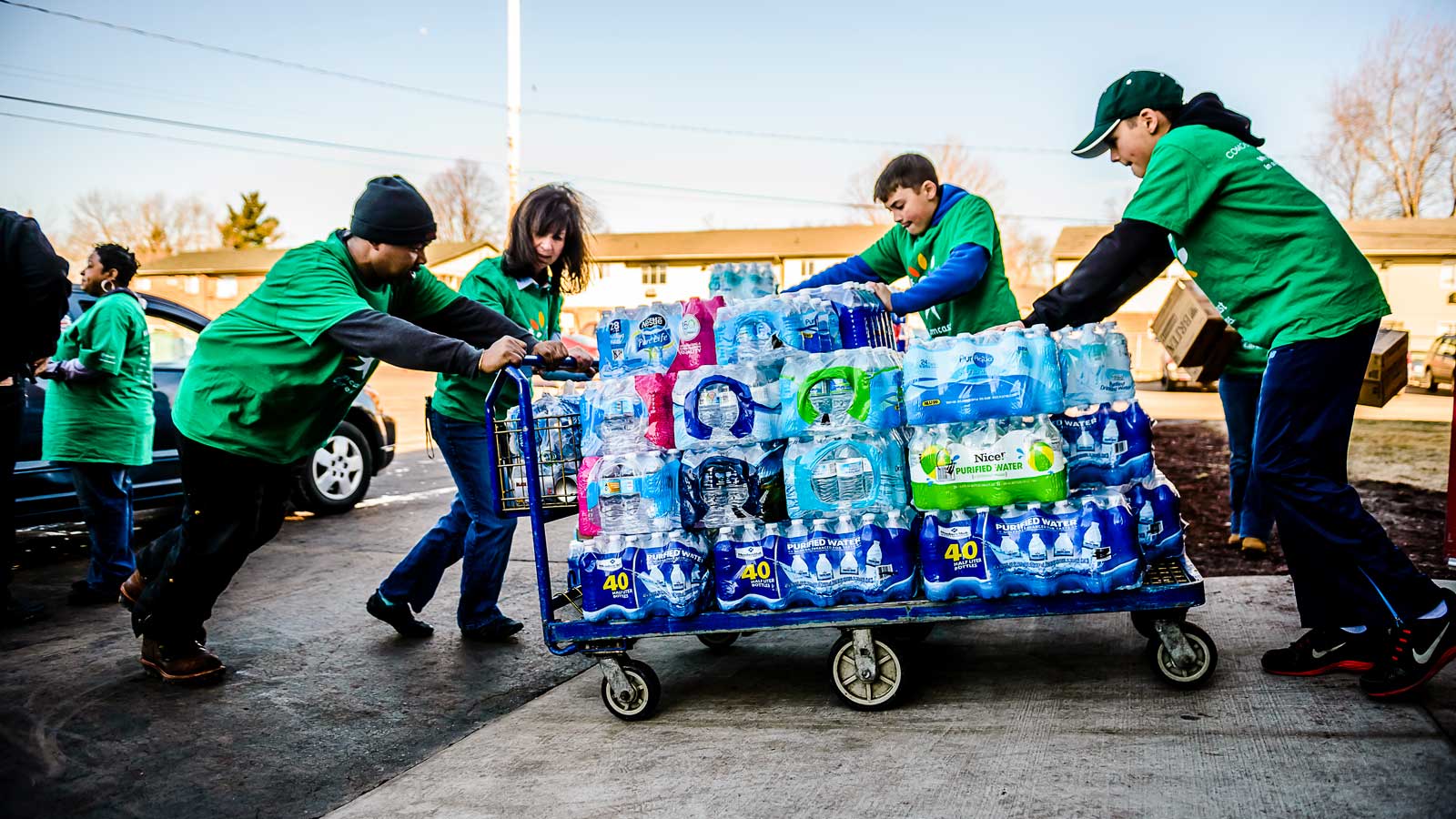 CCD volunteers with bottles of water