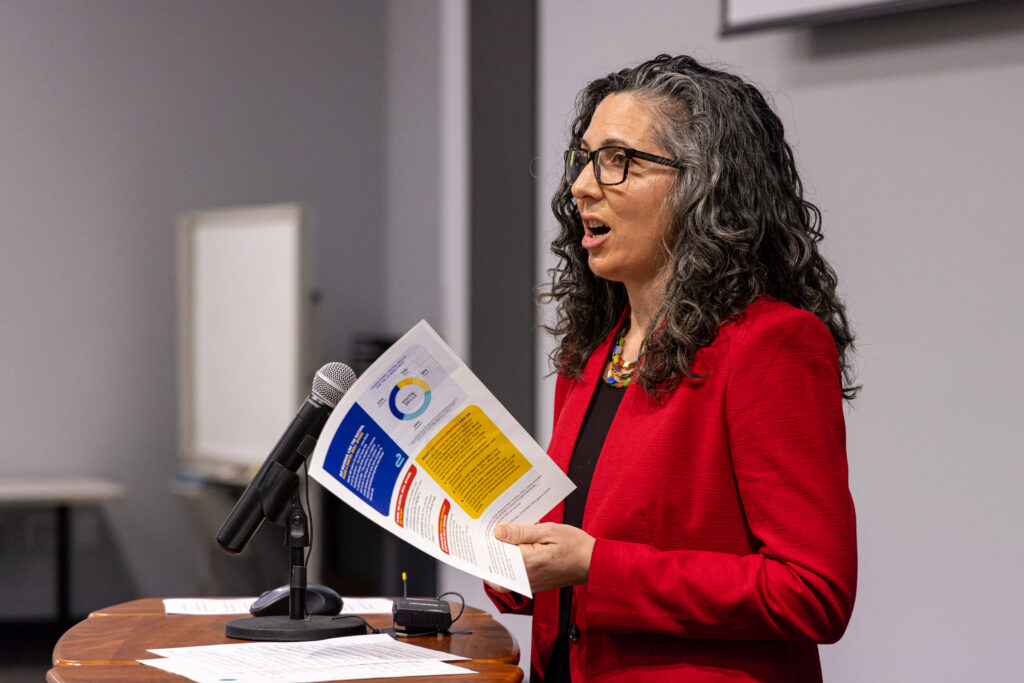 Rachel Unruh speaking at panel