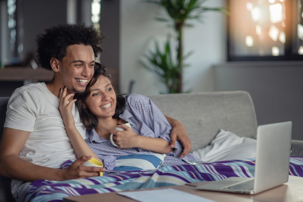 A couple on devices connected to Xfinity Internet in Michigan. They are a part of the company’s Five-Year Price Guarantee offering no contract, unlimited data and one year of Unlimited Xfinity Mobile included.