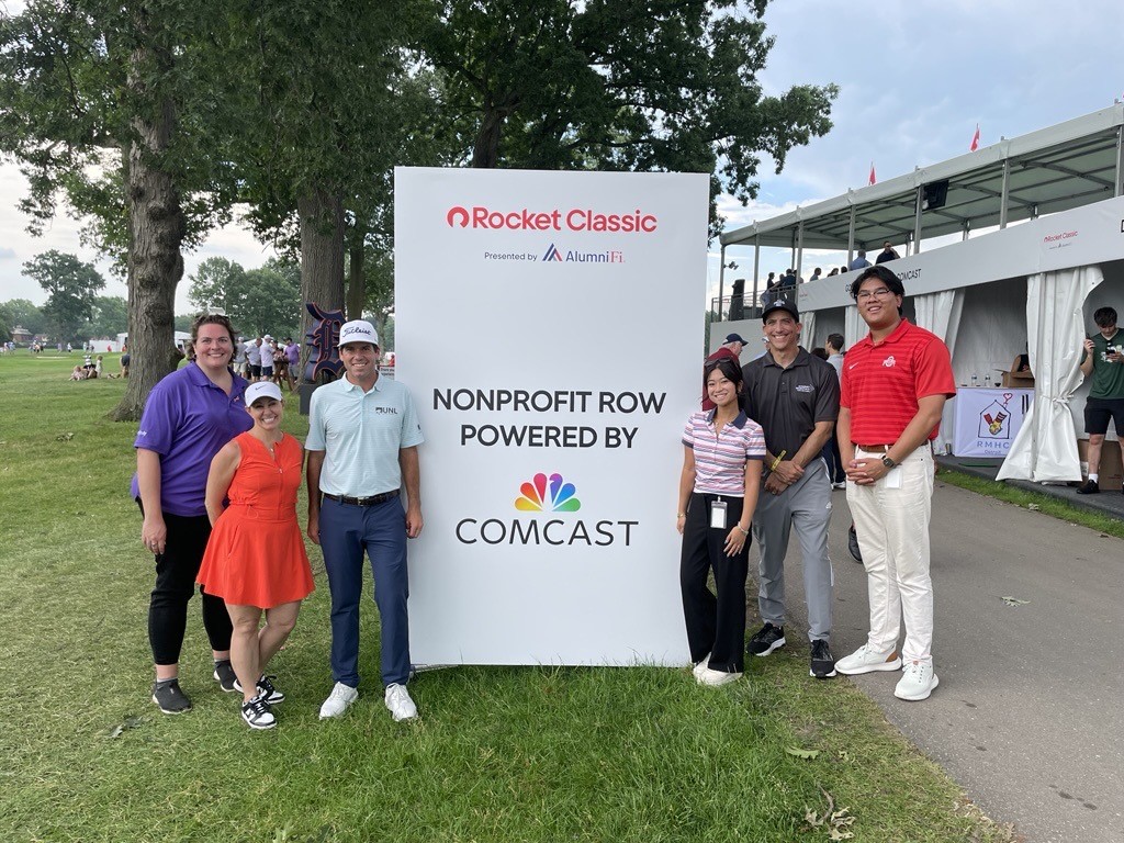 Comcast Heartland team members pose for a photo with American PGA Professional Ben Martin.
